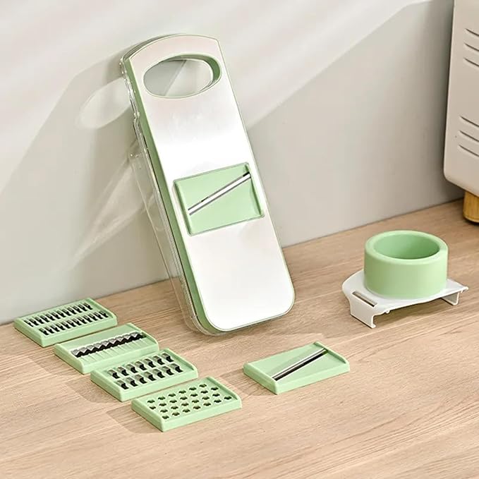 Multipurpose Compact Kitchen Mandoline Vegetable Slicer, Cutter, Cabbage Shredder, Cheese Shredder, with Container. Includes a Cut Resistant Glove & Super Sharp Potato Peeler. Stainless Steel Surface.