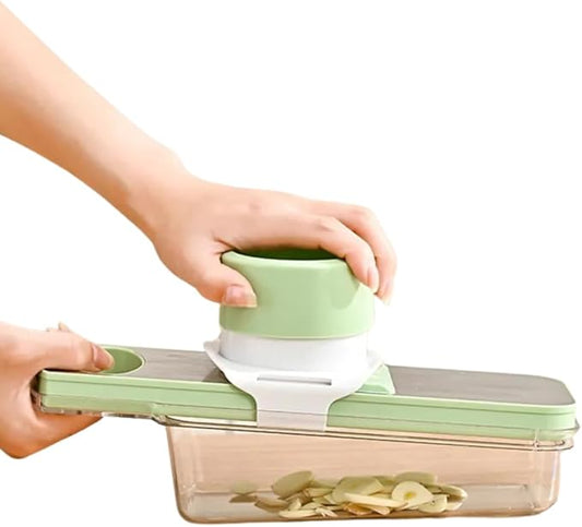 Multipurpose Compact Kitchen Mandoline Vegetable Slicer, Cutter, Cabbage Shredder, Cheese Shredder, with Container. Includes a Cut Resistant Glove & Super Sharp Potato Peeler. Stainless Steel Surface.