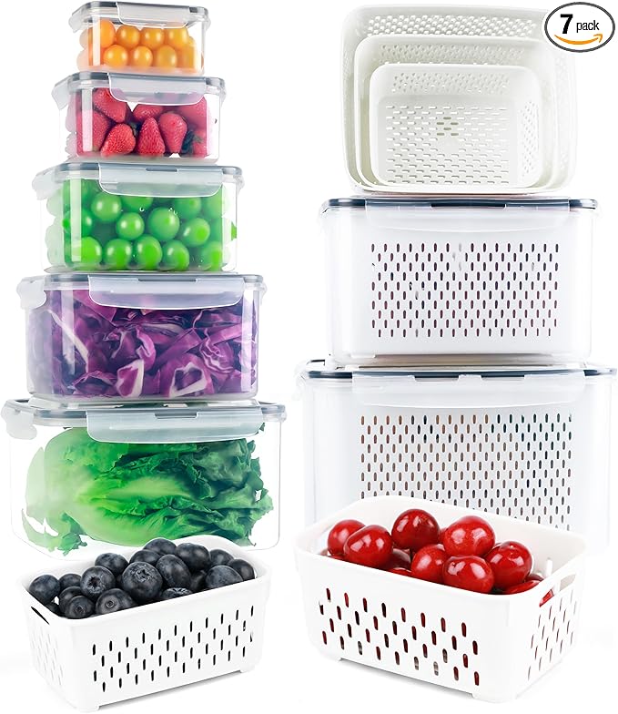 Set of white storage containers with lids containing various fruits and vegetables.
