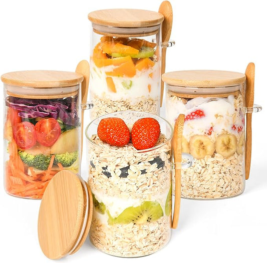 Set of glass jars with wooden lids filled with various foods on a white background